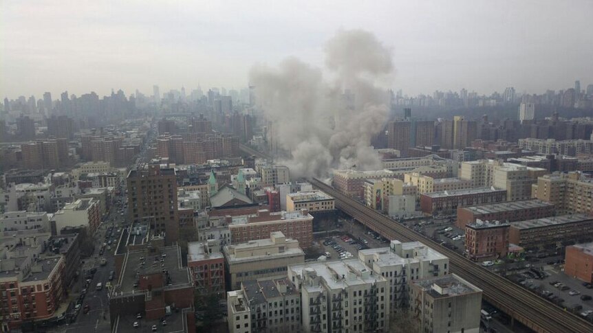 Smoke rises after building explosion in Harlem