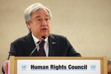 António Guterres speaks from a podium at the United Nations human rights council.