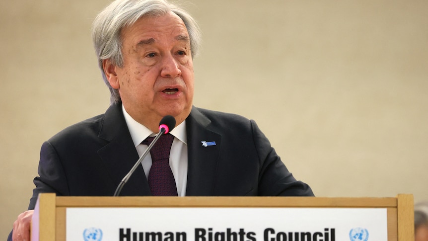 Antonio Guterres speaks from a podium at the United Nations human rights council.