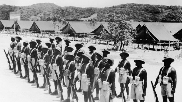 Members of the Torres Strait Light Infantry Battalion on parade during World War II.