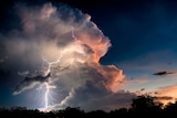 Massive storm cloud with impressive lightning bolt
