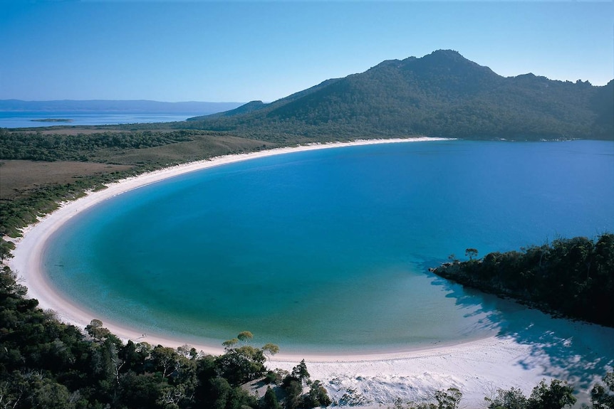 Blue skies over Wineglass Bay in Freycinet National Park on Tasmania's east coast,