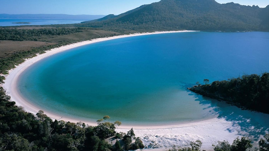 Blue skies over Wineglass Bay in Freycinet National Park on Tasmania's east coast,