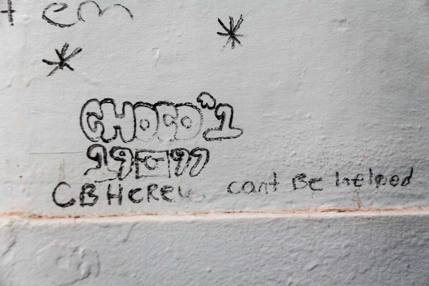 Graffiti on a prison wall.