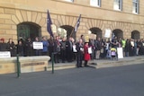 Protesters at the front door to Hobart's Parliament House