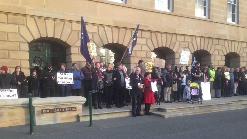 Protesters at the front door to Hobart's Parliament House