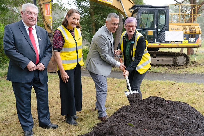 Shoalhaven Councillors and the boss of Bioelektra Australia turn the first sod at the West Nowra facility.