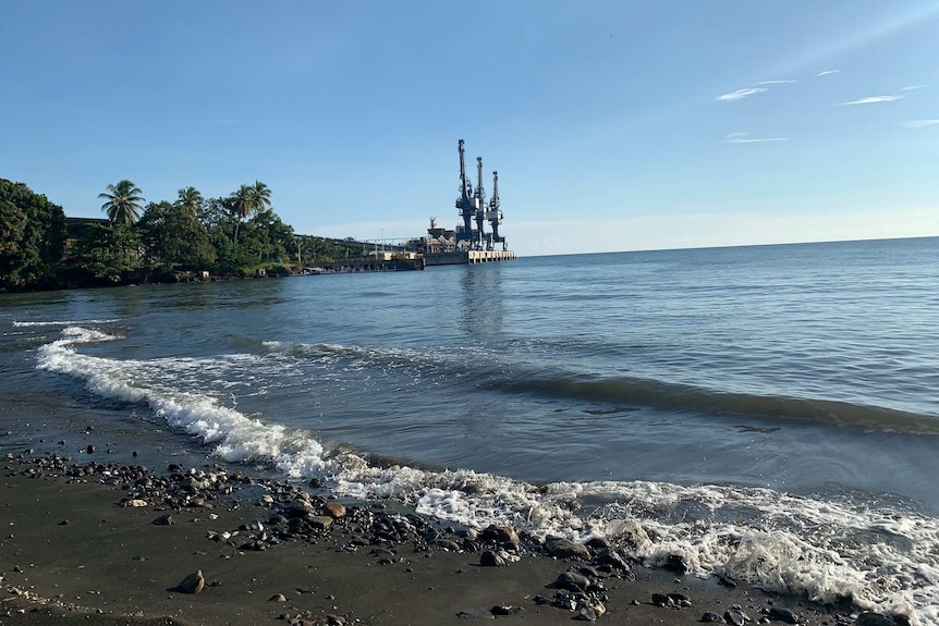 Basamuk Bay, and the Chinese-owned Ramu nickel plant, with clear water in an image taken before the spill.