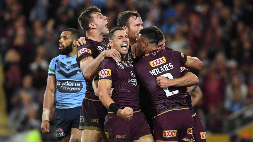 Billy Slater and the Maroons celebrate Daly Cherry-Evans' try in State of Origin III.