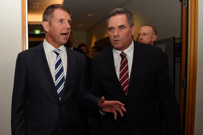 Two men in suits walking