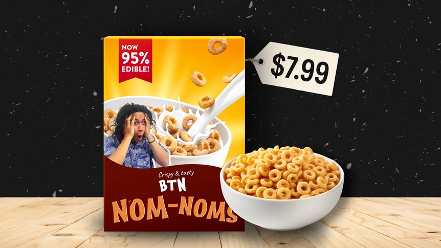 A box of 'BTN nom Noms' cereal with a $7.99 price tag on it and a bowl of cereal next to it.