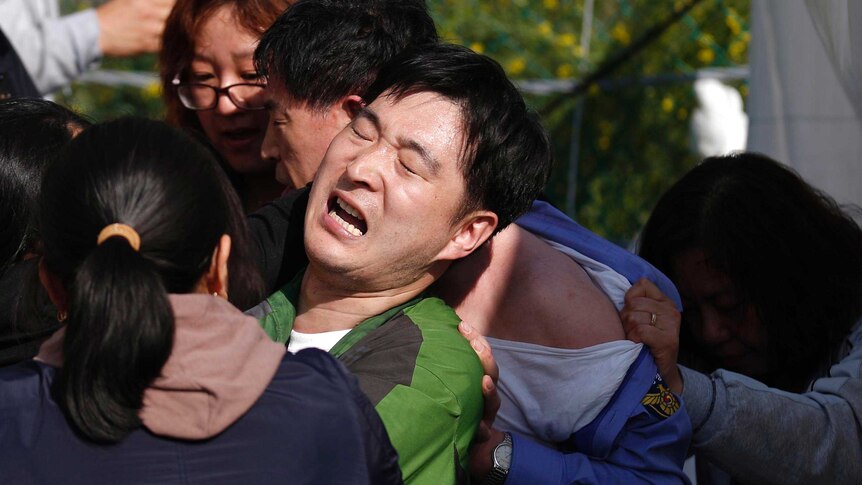 Relatives confront South Korean officials over ferry disaster