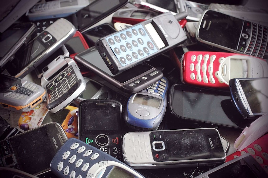 A pile of old mobile phones.