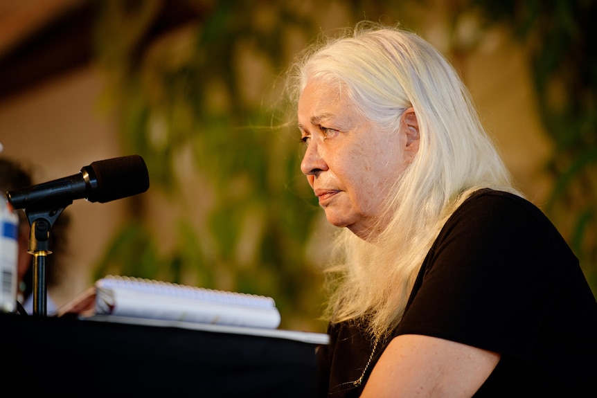 Marcia Langton at a podium. 