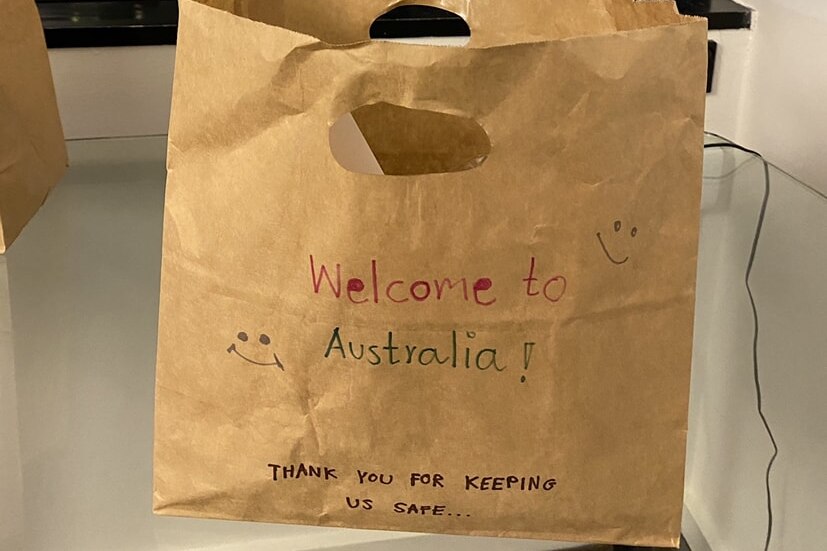 A paper bag handwritten with "welcome to Australia"
