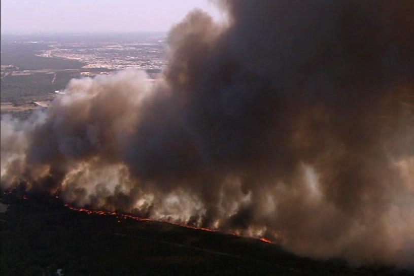 An aerial shot of a bushfire.