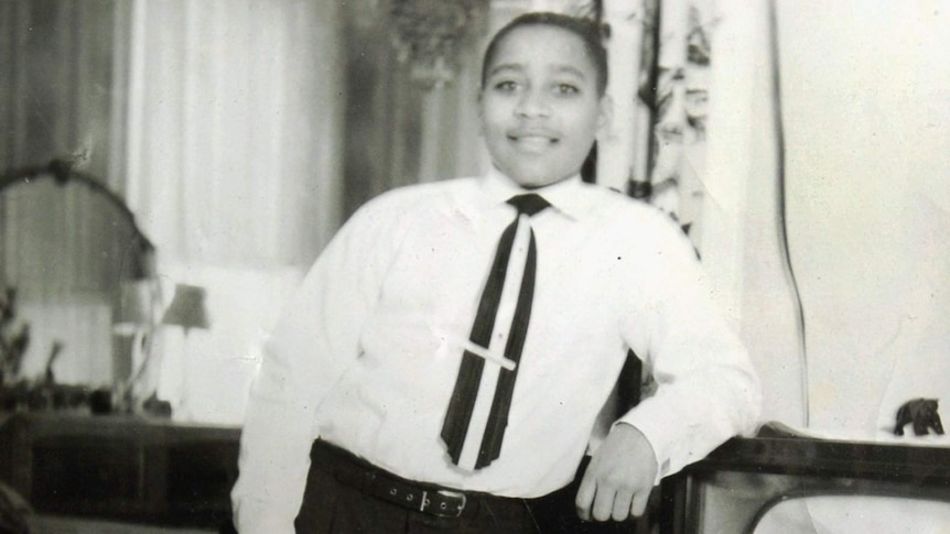 Emmett Till stands posing for a portrait. Date unknown.