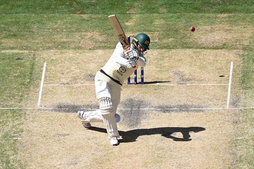 Australia batter Alex Carey hits a cricket ball during the Boxing Day Test against Pakistan at the MCG.