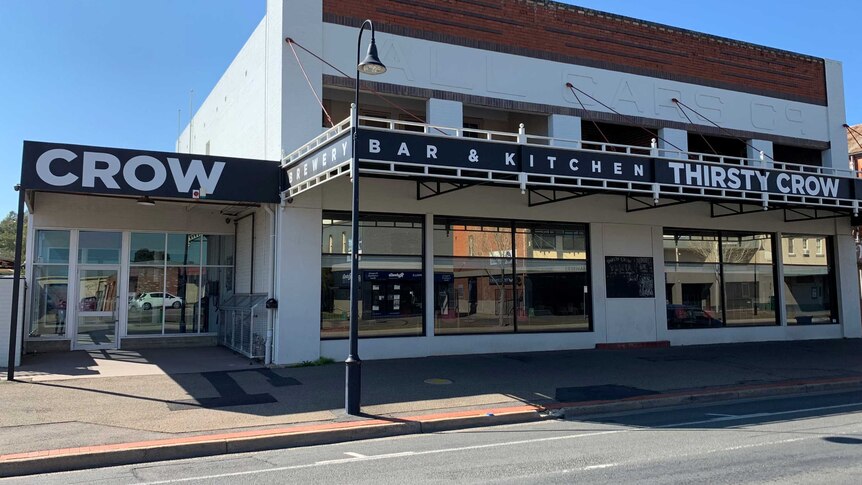 Front of a brewery in a main street