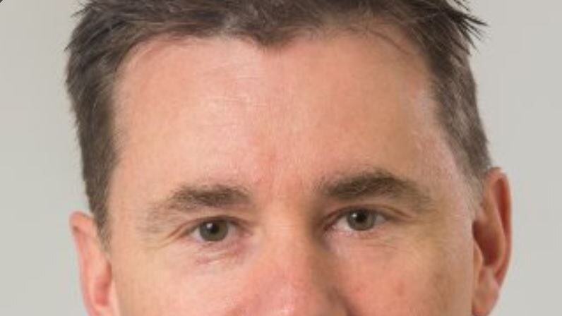 Headshot of head of threat intelligence at private security firm FireEye, Tim Wellsmore.
