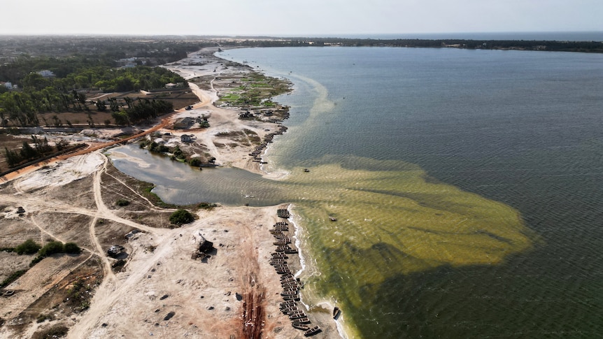 Senegal's Lake Retba loses pink colour after flooding, putting livelihoods at risk
