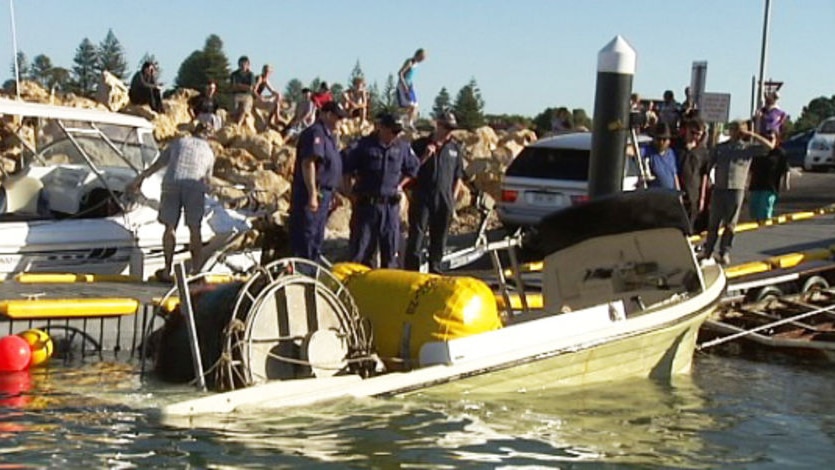 Sunken boat retrieved, but no trace of missing deckhand