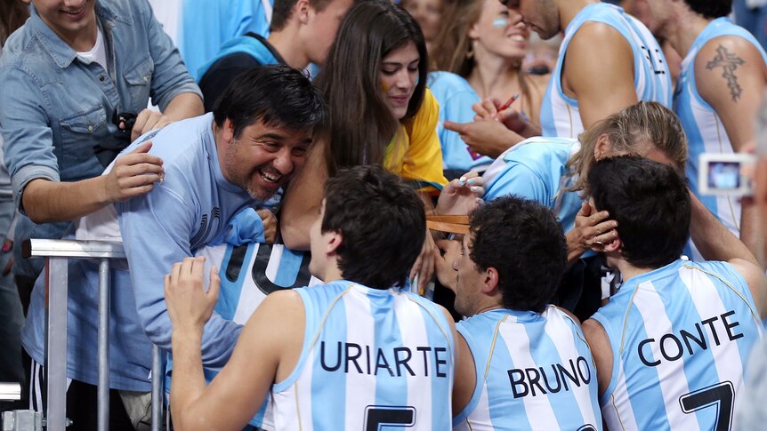 Nicolas Uriarte and team-mates greet supporters