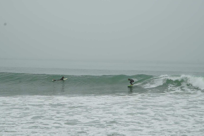 Chris Taloa surfing at Topanga