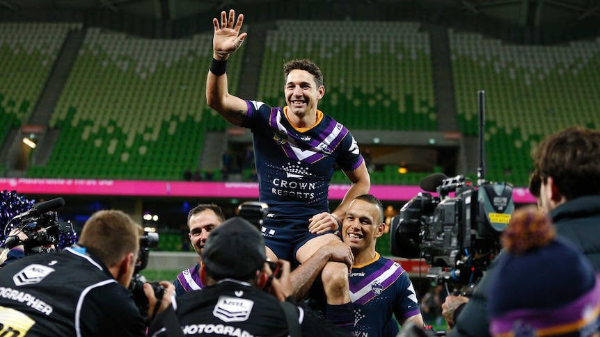 Billy Slater of the Storm is chaired off the ground after the Preliminary Final against Cronulla.
