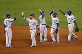Kansas City Royals players celebrate a win over San Francisco Giants in World Series game three.