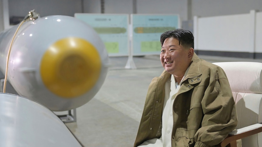 North Korean leader Kim Jong Un inspects what it says unmanned underwater nuclear attack craft.