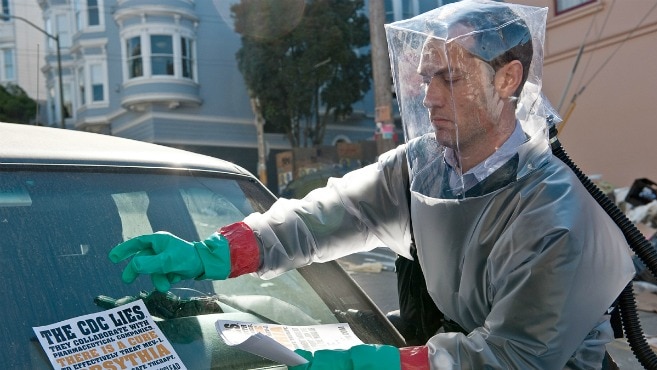 Jude Law in the movie Contagion putting leaflets under car windscreen wipers