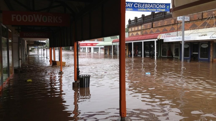 Floodwaters flow through Laidley in the Lockyer Valley.