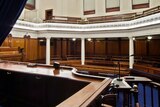 An empty courtroom inside the Supreme Court of Victoria.