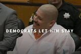 Still from video showing Luis Bracamontes grinning in court, with the words "DEMOCRATS LET HIM STAY" superimposed on the shot