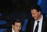 Directors Shaun Tan (L) and Andrew Ruhemann accept the award for best animated short film
