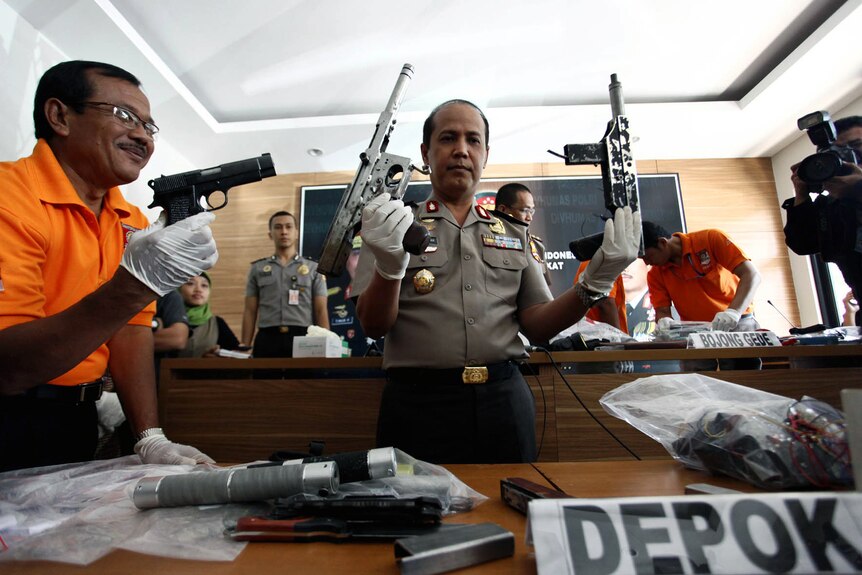 Indonesian national police spokesman Boy Rafli Amar shows evidence found at a blast site in Depok.