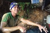 Chicco, who works at an illegal mine near Jakarta