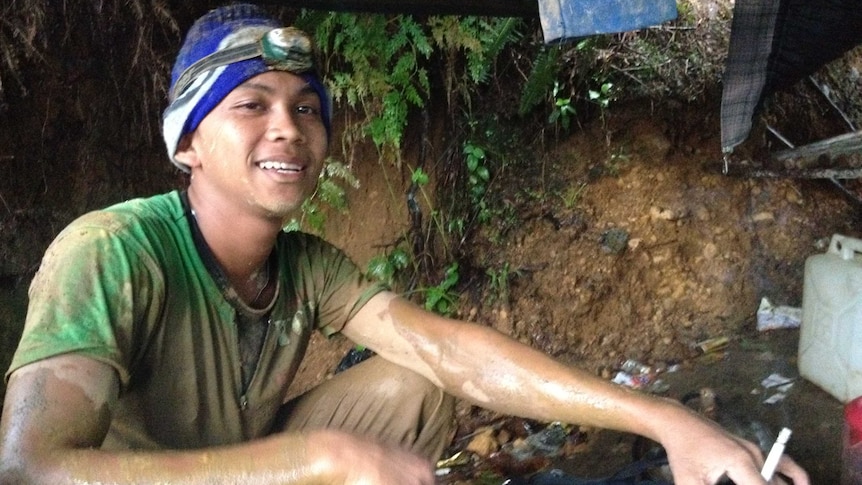Chicco, who works at an illegal mine near Jakarta