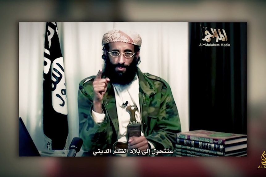 A screenshot from the video showing Islamic militant Anwar al-Awlaki telling Muslims that they must leave or fight.