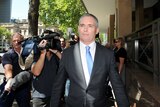 Craig Thomson leaves Melbourne Magistrates Court after being found guilty of fraud