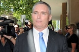Former federal MP Craig Thomson leaves Melbourne Magistrates Court after being found guilty of fraud.