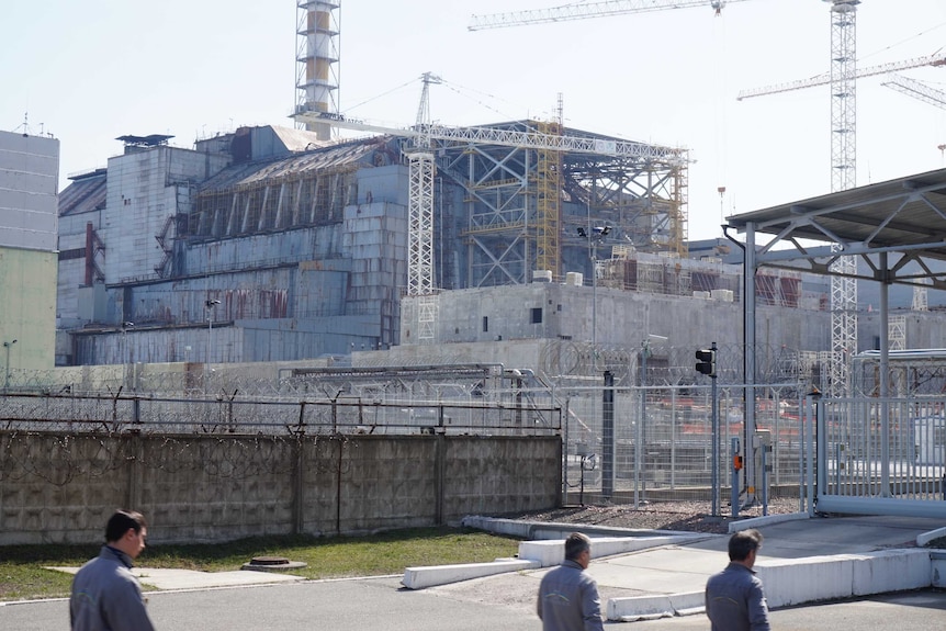 Workers arriving for work at reactor number four in Chernobyl.