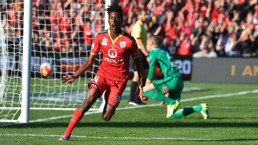 Adelaide's Bruce Kamau reacts after goal against Western Sydney Wanderers in A-League Grand Final.