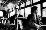Rosa Parks sits on a bus