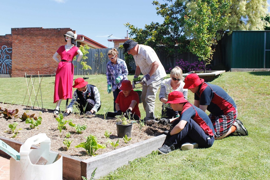 Students from the Northern Support school in a Launceston garden