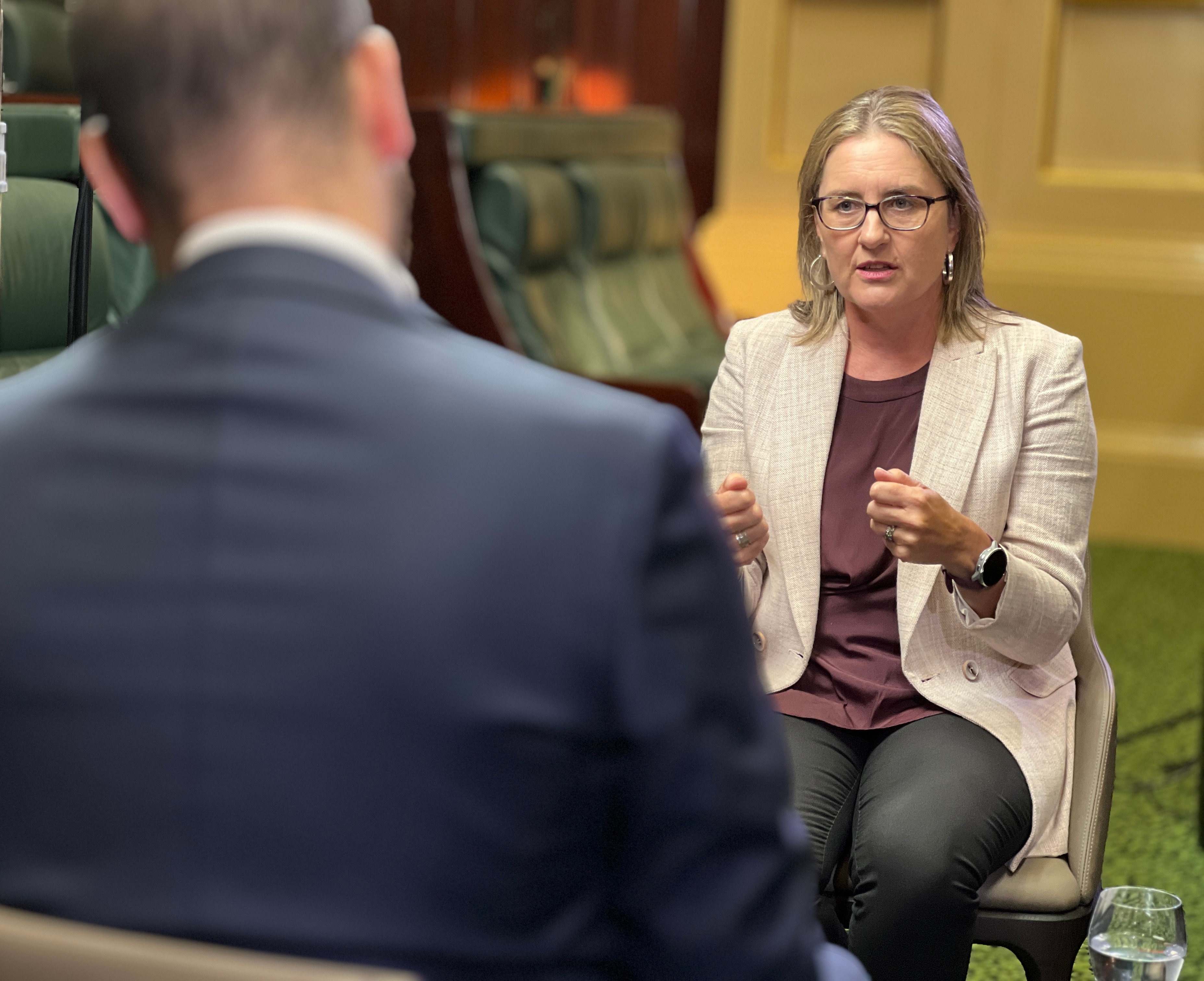 Jacinta Allan sitting across from Richard, engrossed in conversation.