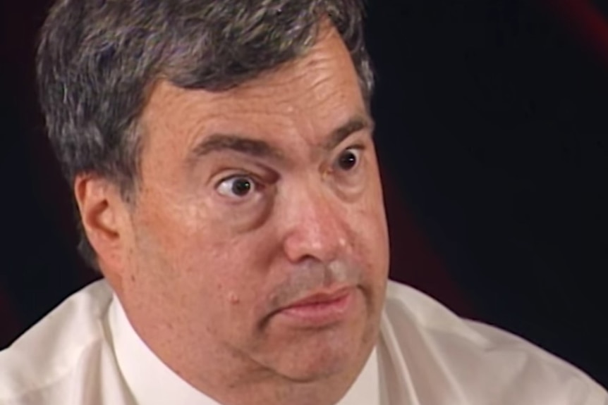 Chicago Bulls general manager Jerry Krause raises his eyebrows.