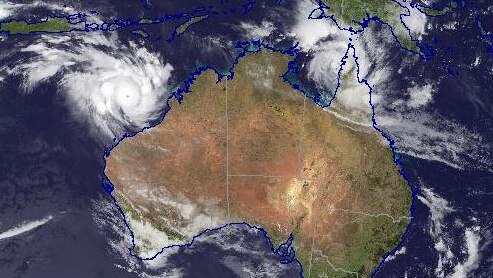 A satellite image showing cyclones Veronica and Trevor off the northern coasts of Australia