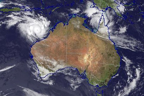 A satellite image showing cyclones Veronica and Trevor off the northern coasts of Australia